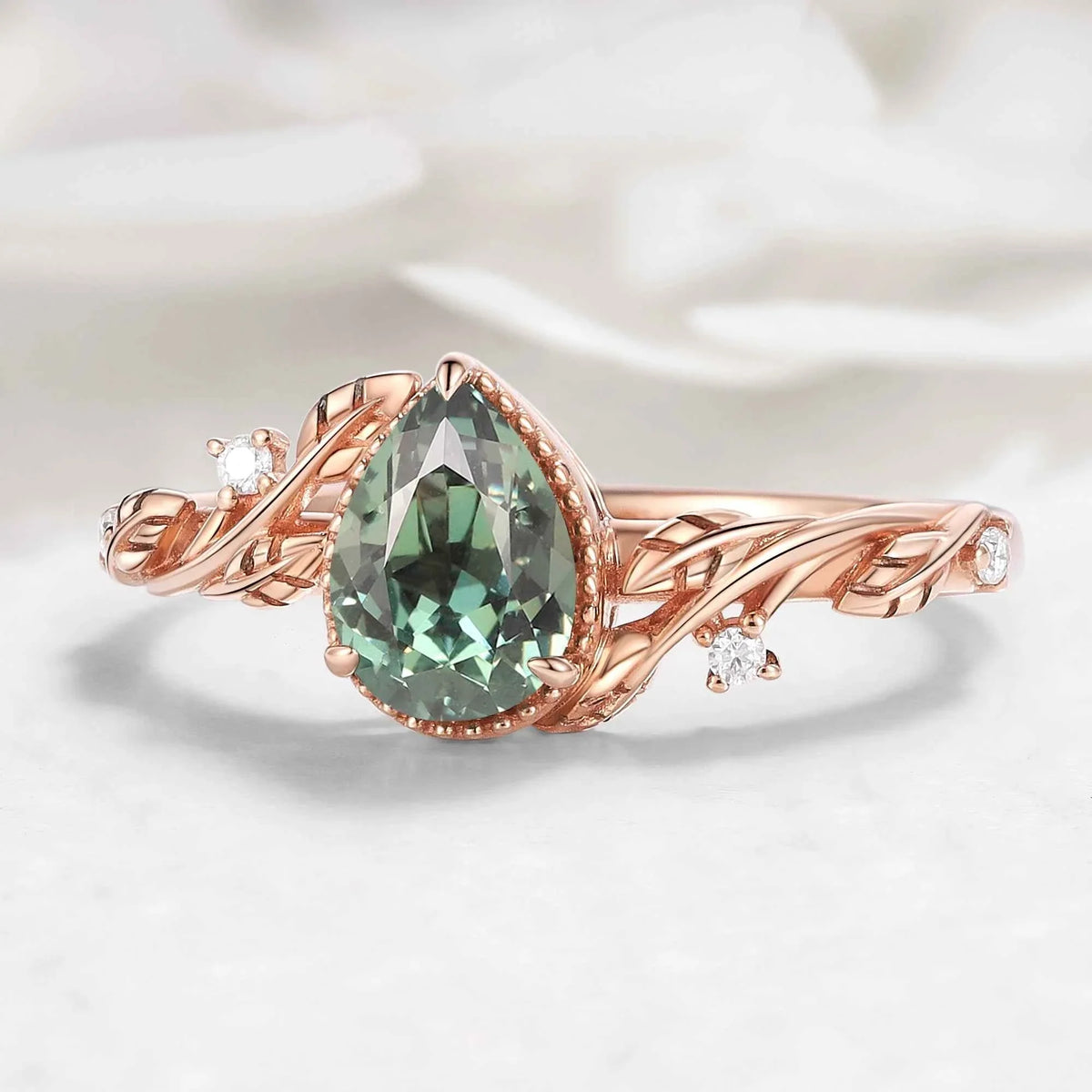 Nature-Inspired Pear Cut Green Sapphire Engagement Ring