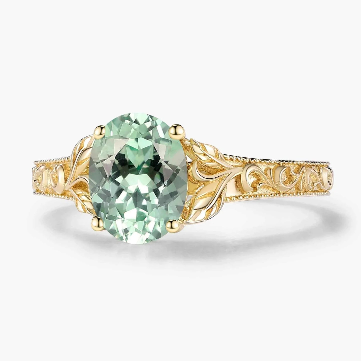 Oval-Cut Green Sapphire Engagement Ring with Leaf-Embraced Band