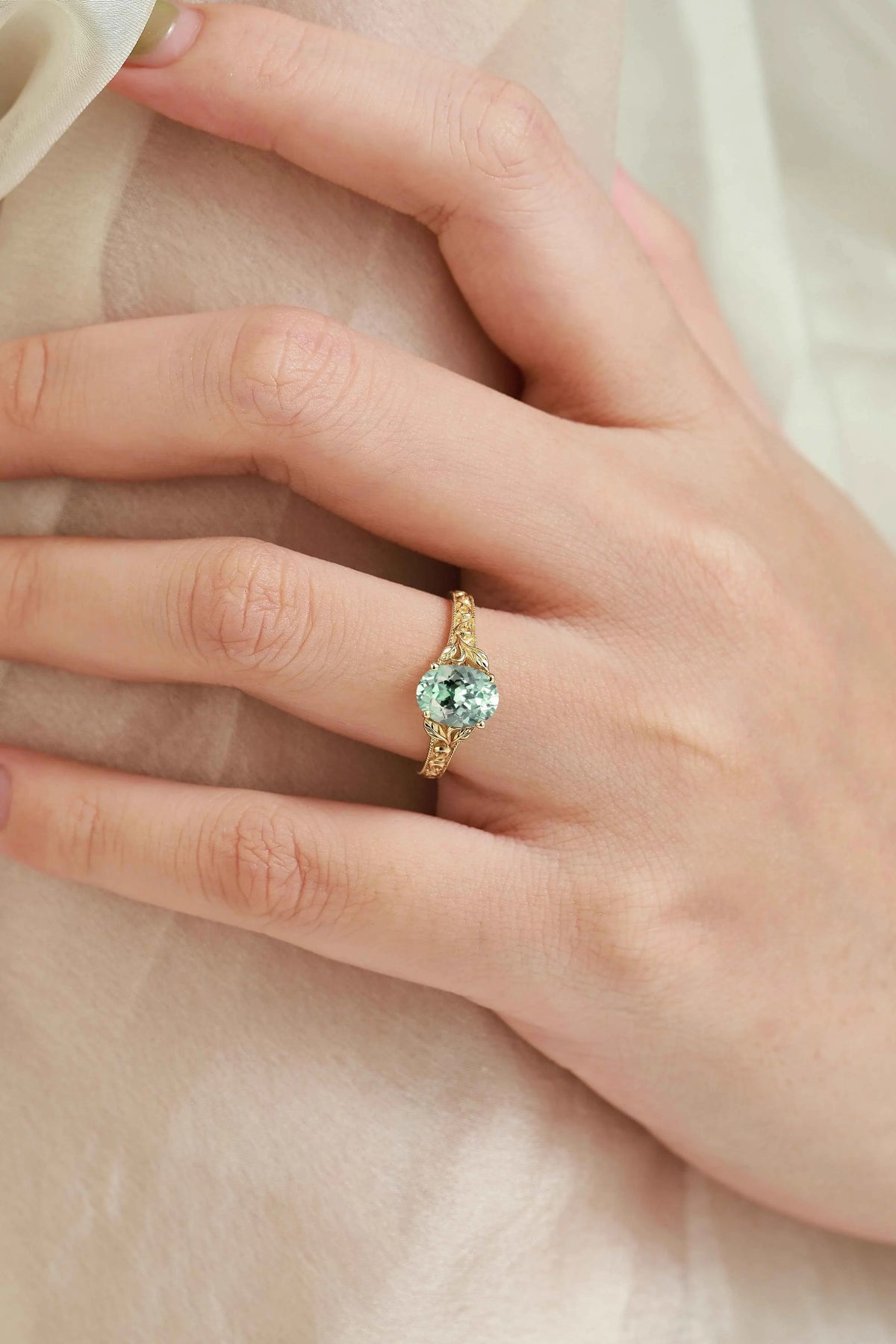 Custom Oval-Cut Green Sapphire Engagement Ring with Leaf-Embraced Band For Willoughby