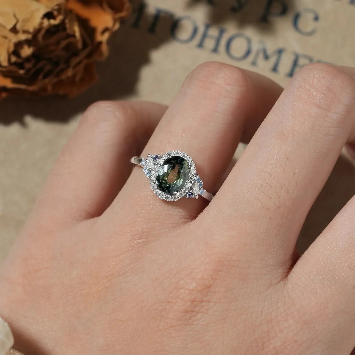 Thalassa’s Mirage | Oval Teal Sapphire Halo Vintage Engagement Ring