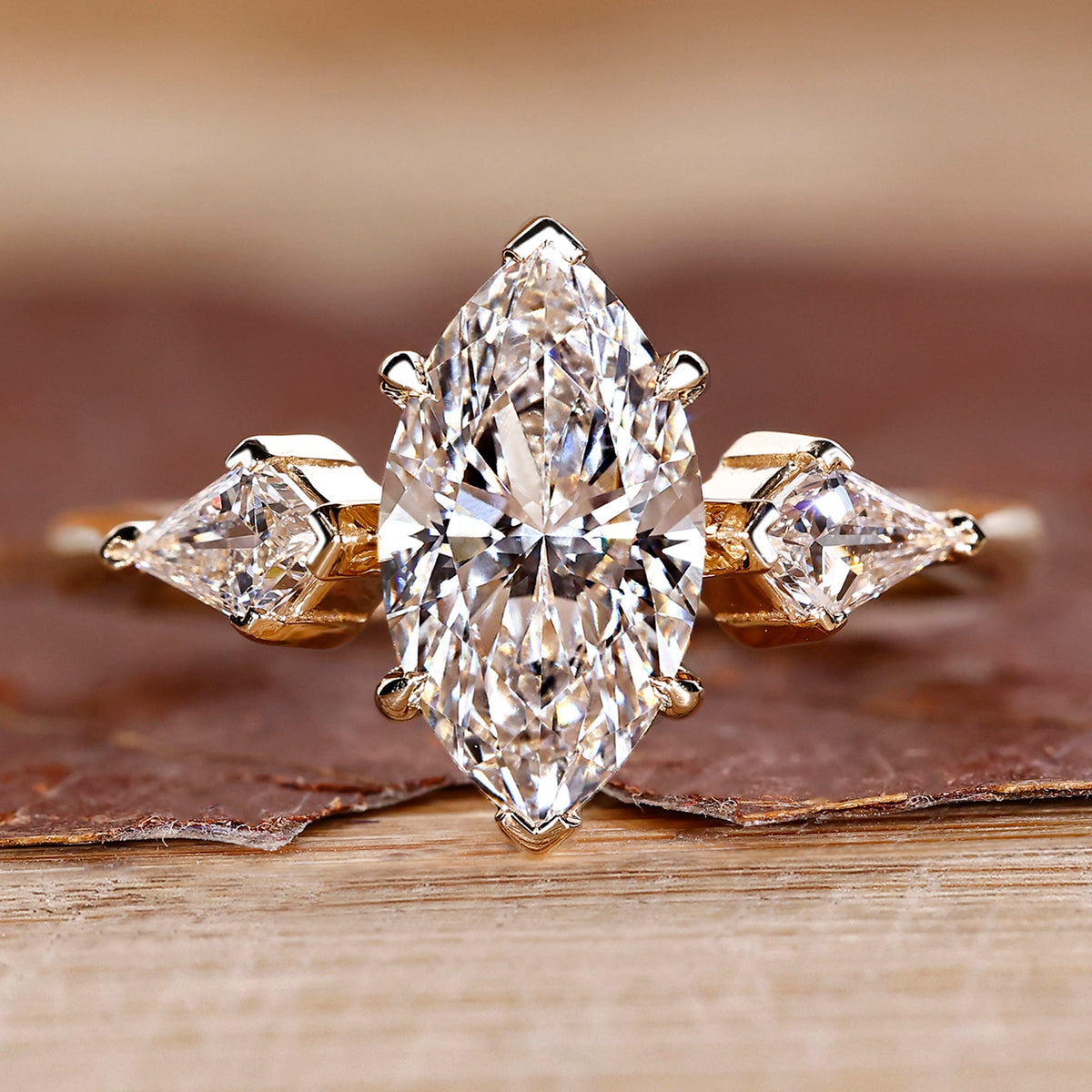 Marquise and Kite Cut Three Stone Engagement Ring