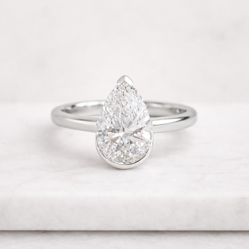 Pear Cut Half Bezel Set Lab Grown Diamond Engagement Ring in 14K Gold
