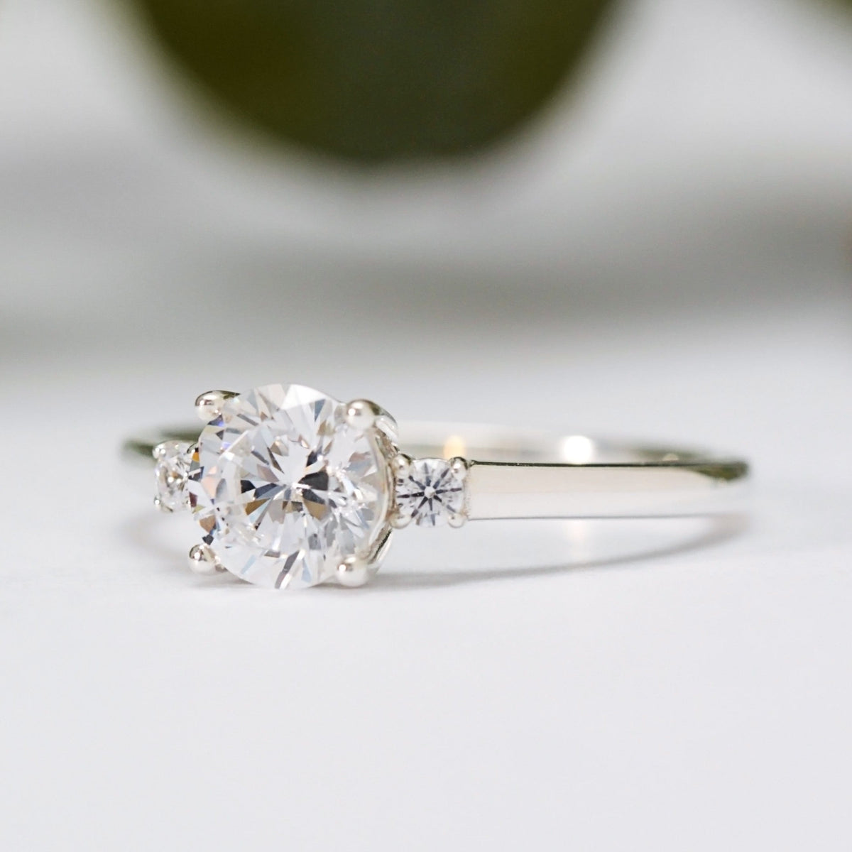 Round Moissanite Trilogy Ring