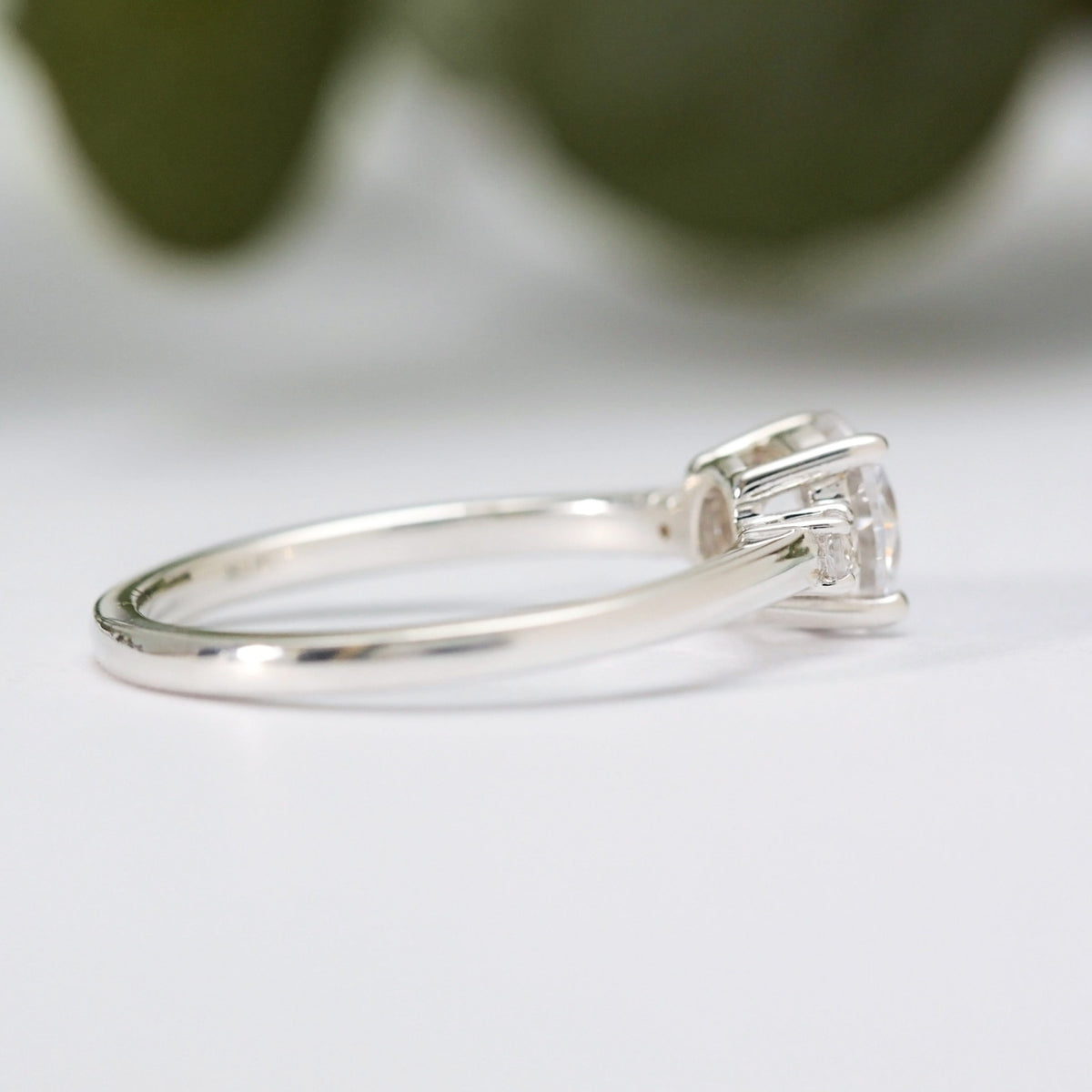 Round Moissanite Trilogy Ring