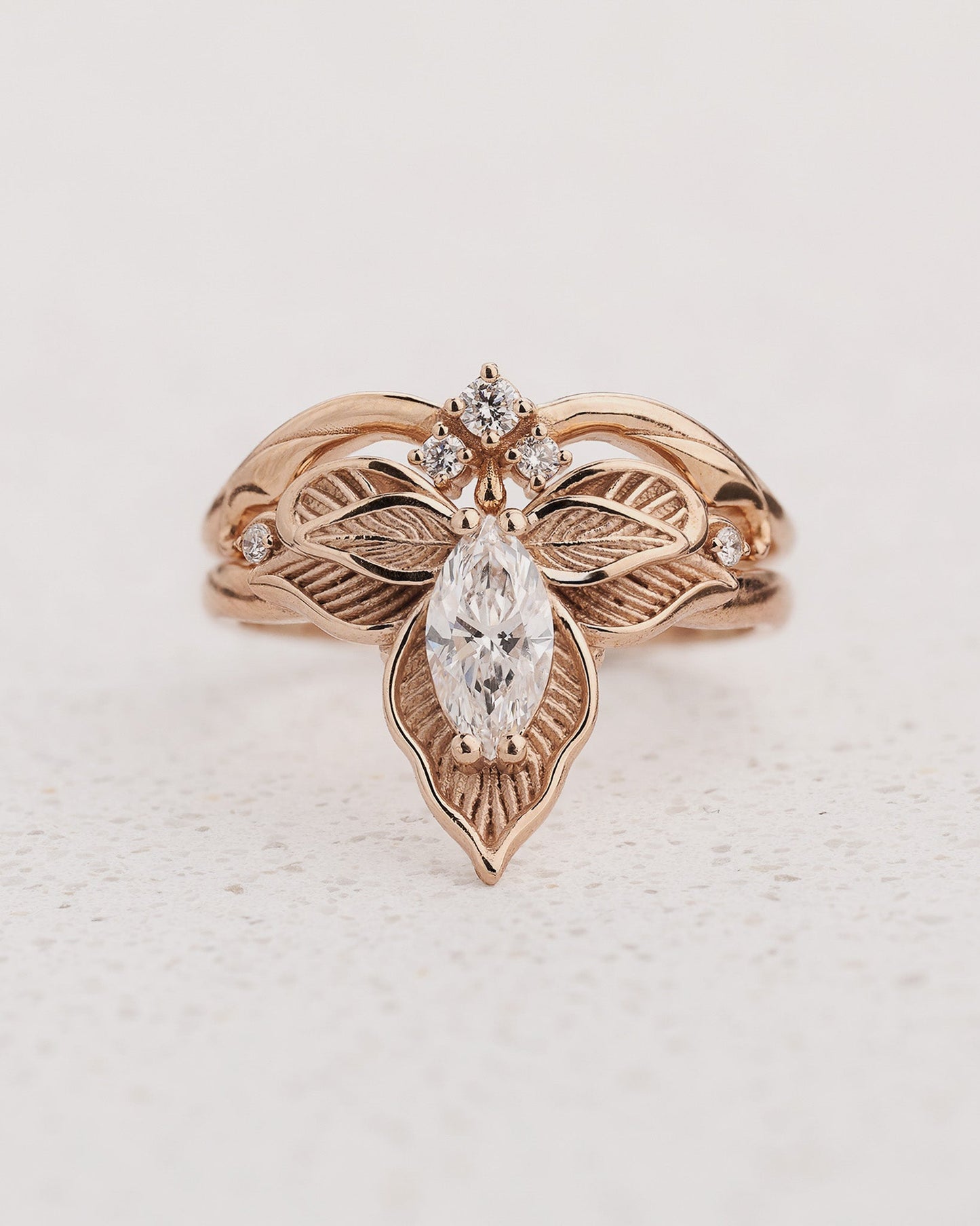 Orchid flower ring set with marquise diamond