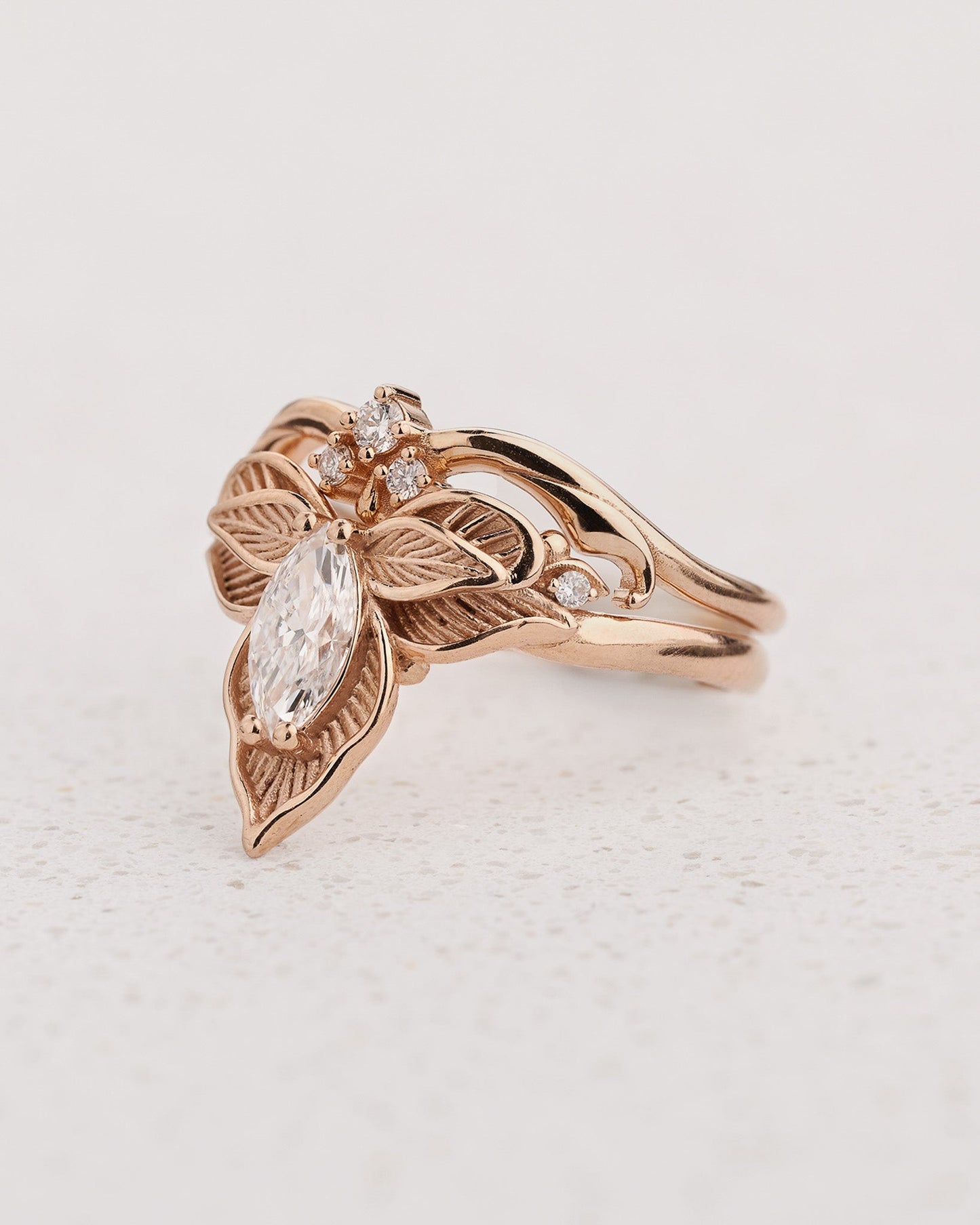 Orchid flower ring set with marquise diamond