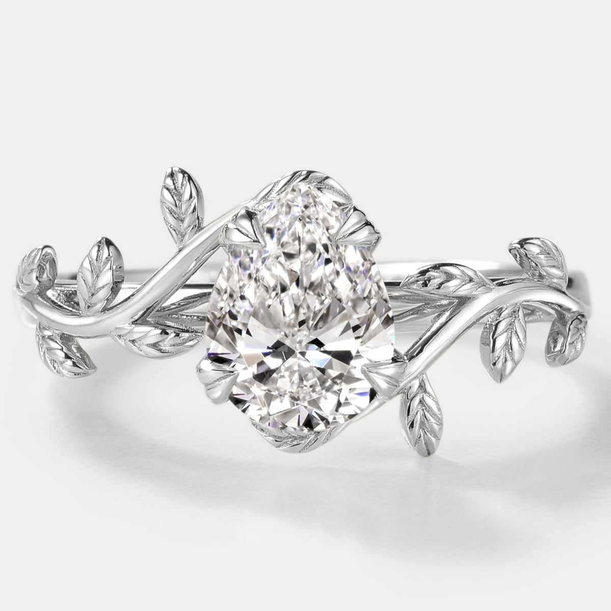 Pear Cut Lab Grown Diamond Engagement Ring With Leaves