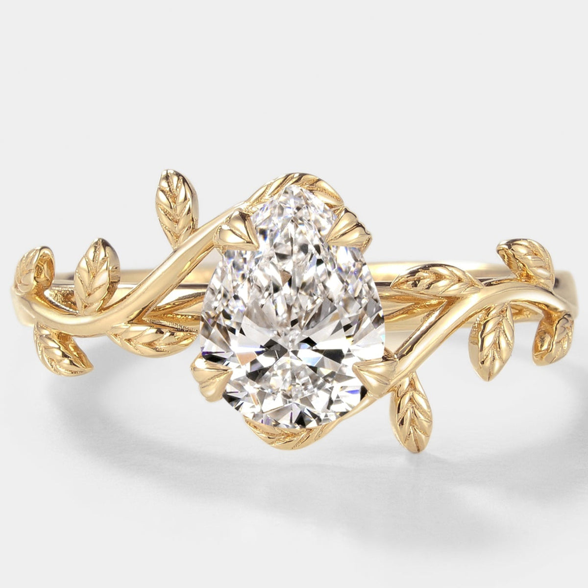 Pear Cut Lab Grown Diamond Engagement Ring With Leaves