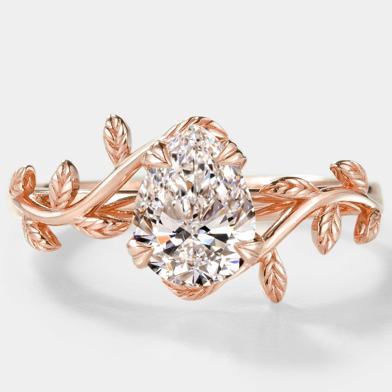 Pear Cut Lab Grown Diamond Engagement Ring With Leaves