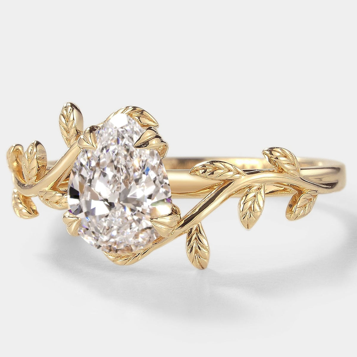 Pear Cut Lab Grown Diamond Engagement Ring With Leaves