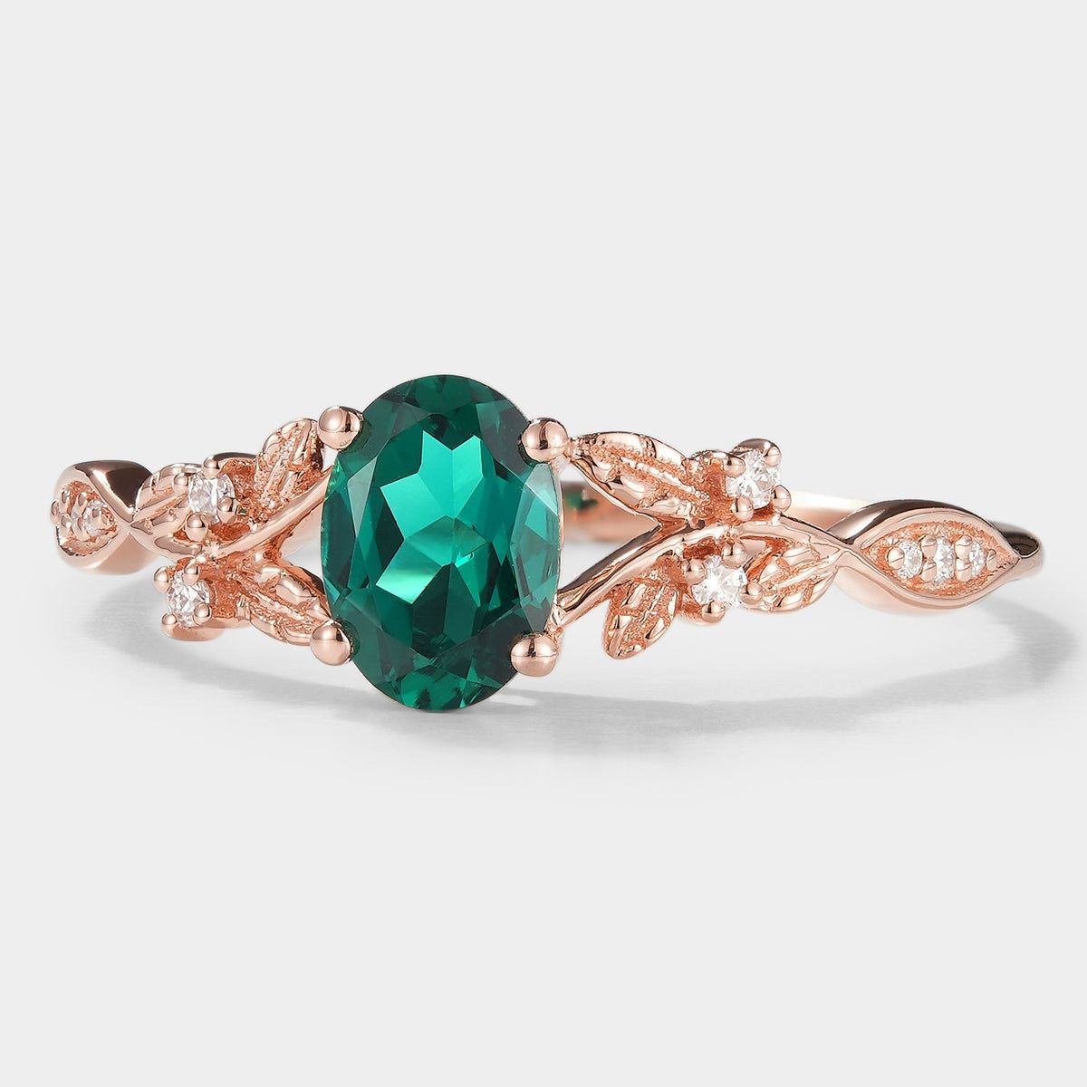Oval Cut Lab Grown Emerald Leaf Engagement Ring