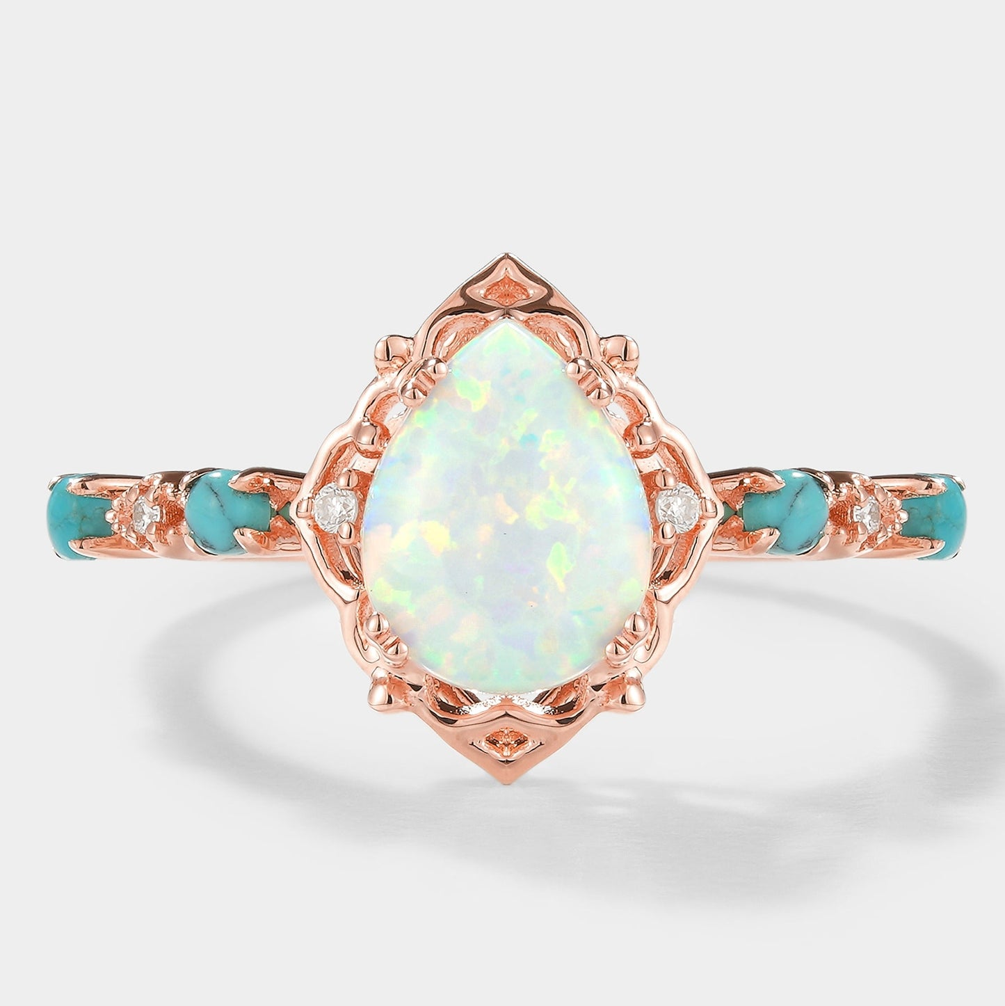 Pear Cut Opal Engagement Ring With Turquoise