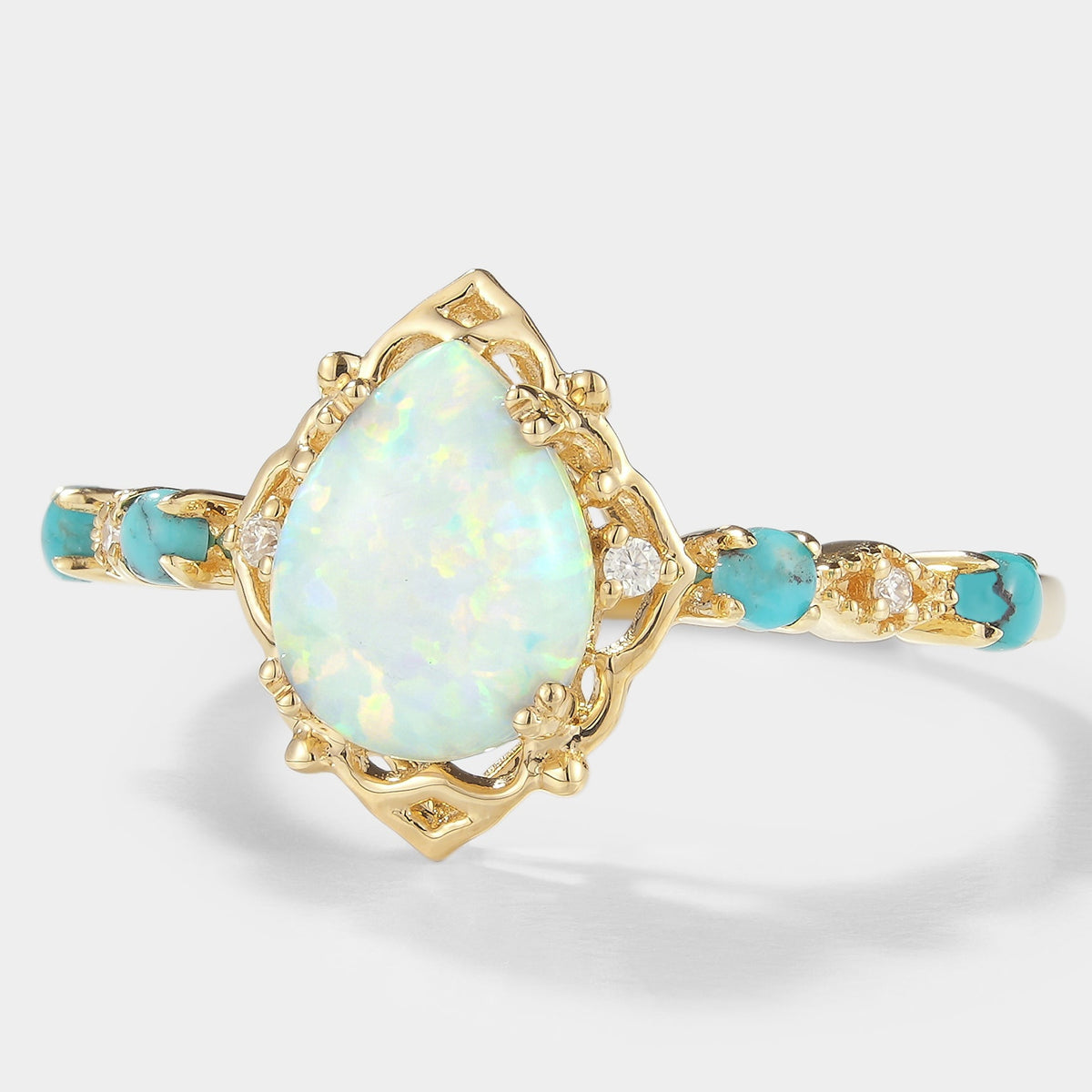 Pear Cut Opal Engagement Ring With Turquoise