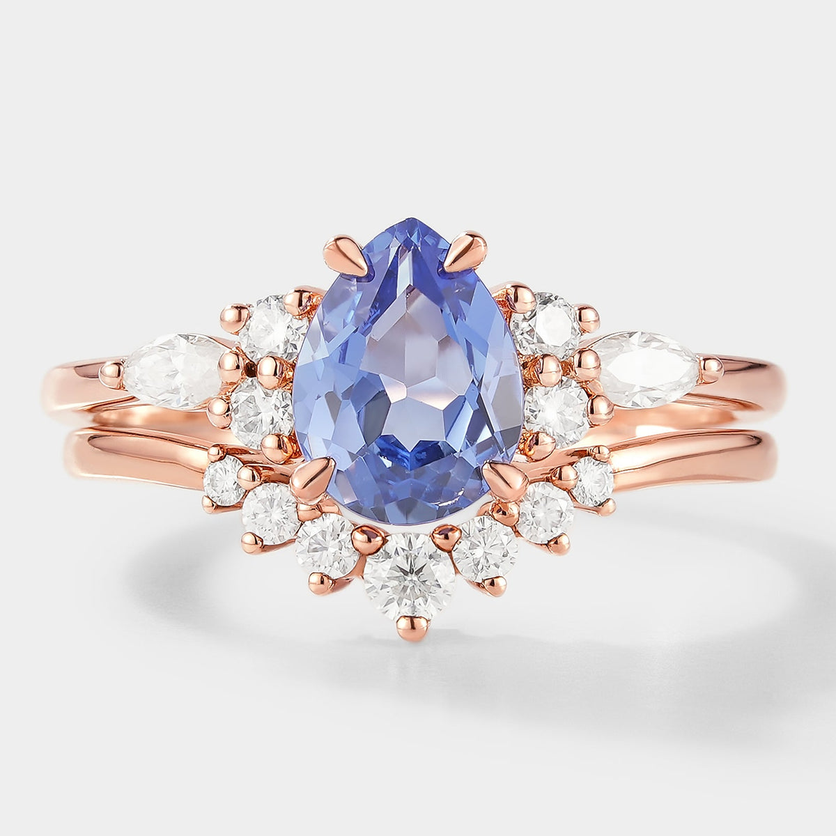 Pear Cut Cornflower Sapphire Engagement Ring With Curved Wedding Band
