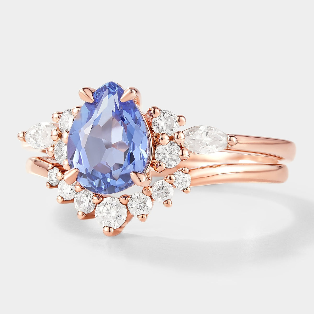 Pear Cut Cornflower Sapphire Engagement Ring With Curved Wedding Band