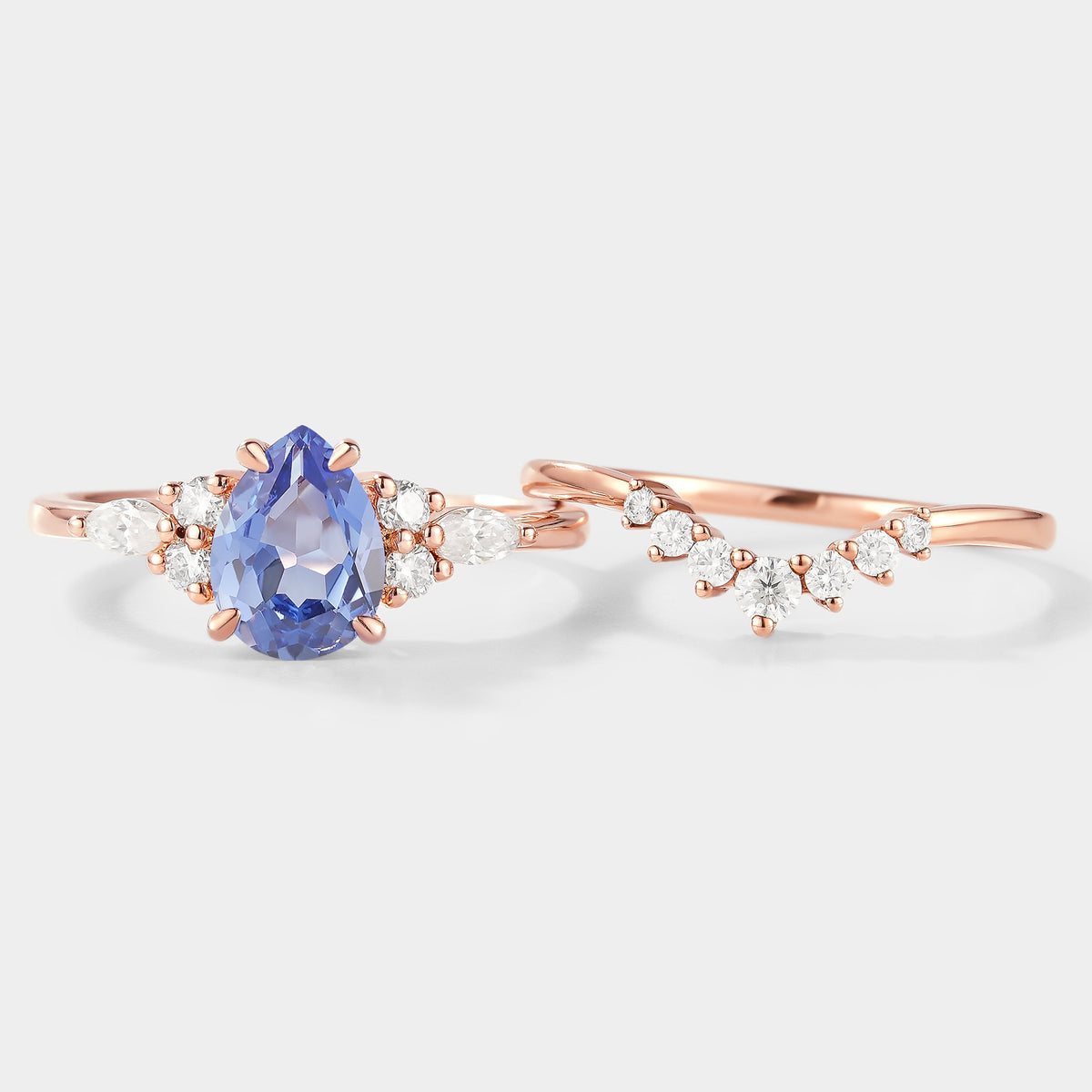 Pear Cut Cornflower Sapphire Engagement Ring With Curved Wedding Band