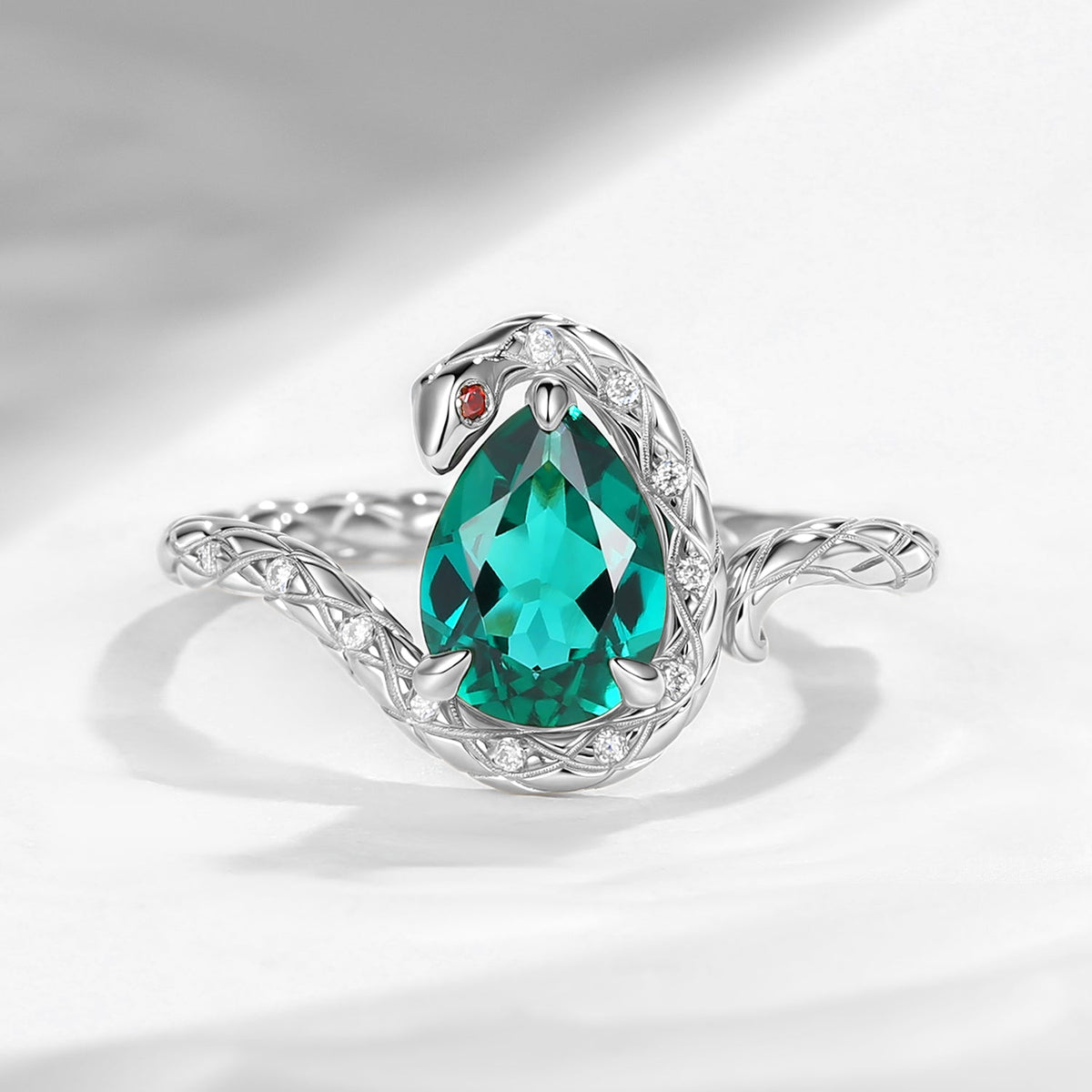 'Serpent's Embrace'- Unique Twist Pear Cut Lab Emerald Engagement Ring