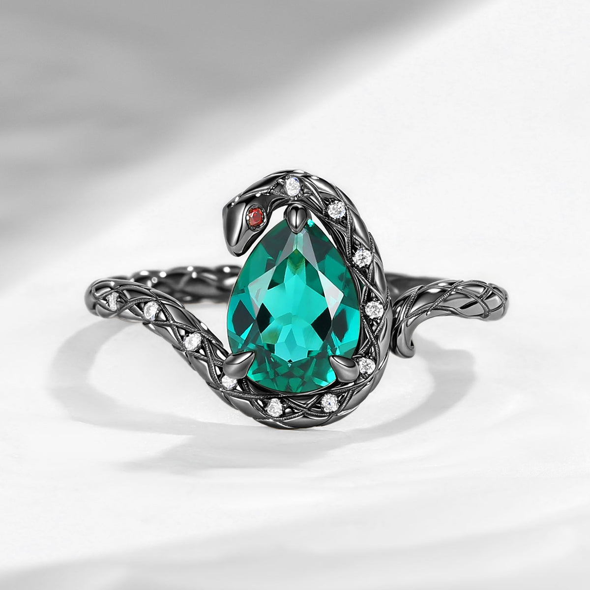 'Serpent's Embrace'- Unique Twist Pear Cut Lab Emerald Engagement Ring