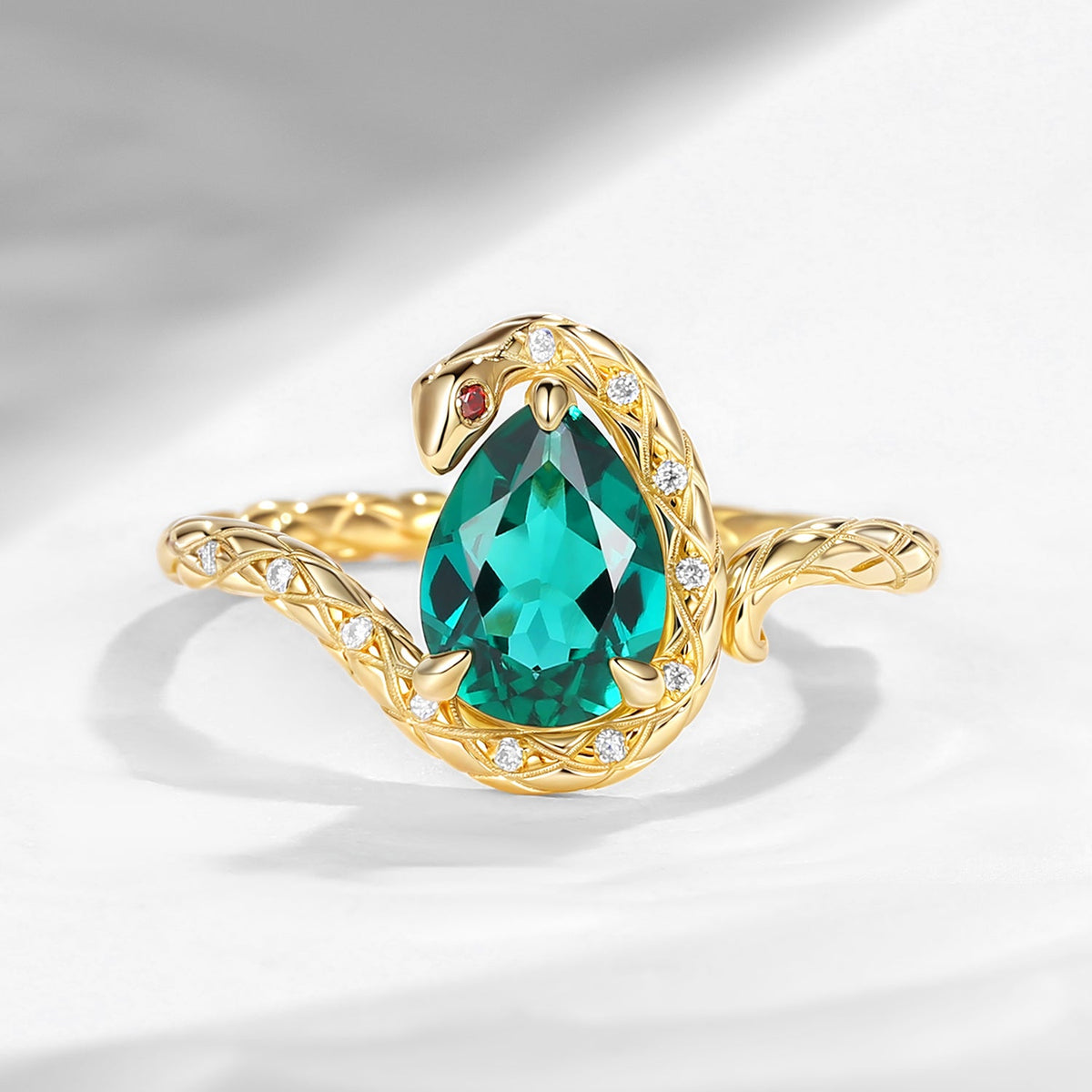 'Serpent's Embrace'- Unique Twist Pear Cut Lab Emerald Engagement Ring