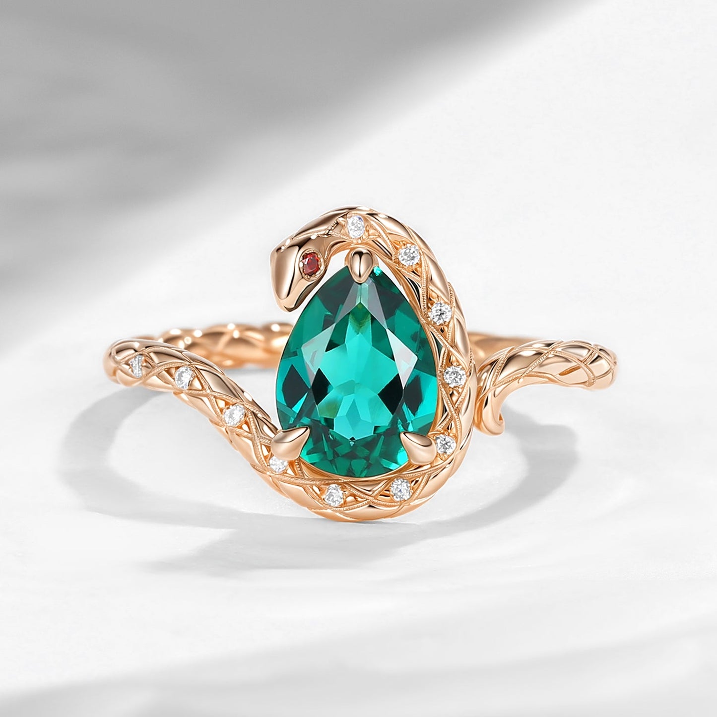 'Serpent's Embrace'- Unique Twist Pear Cut Lab Emerald Engagement Ring