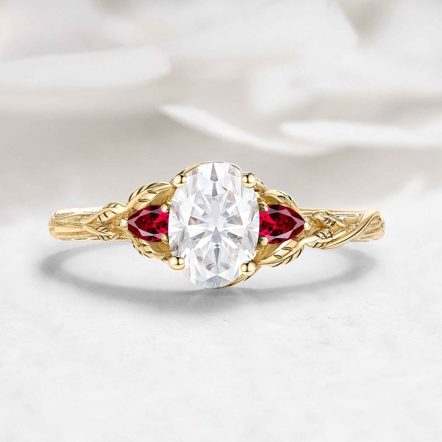 Leaf-Inspired Oval Cut Moissanite and Ruby Engagement Ring For Jarred