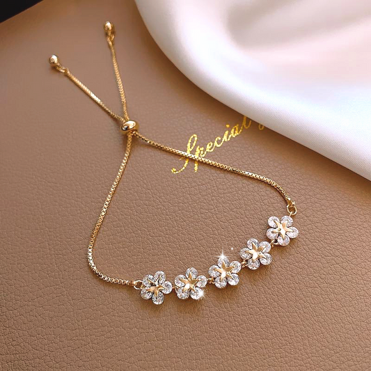 CRYSTAL FLOWER & STAR BRACELET